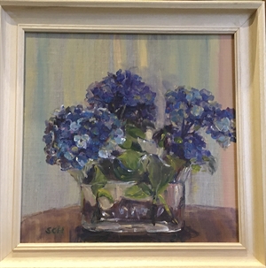 173.  Hydrangeas in a glass vase