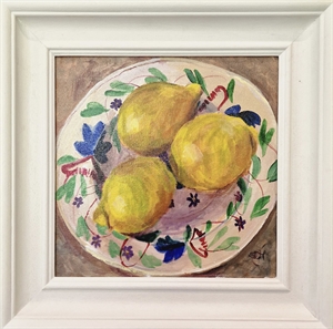 44.  3 lemons on decorative plate